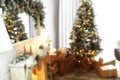 Blurred view of beautiful Christmas tree in room interior Royalty Free Stock Photo