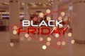 Blurred view of big shopping mall. Black Friday Sale Royalty Free Stock Photo