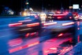 Blurred view of city traffic. cars driving on wet road. Royalty Free Stock Photo