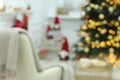 Blurred view of decorated Christmas tree in living room. Interior design Royalty Free Stock Photo