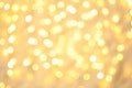 Blurred view of golden Christmas lights as background Royalty Free Stock Photo