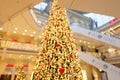 Christmas in the Shopping Center - Detail view with big Christmas Tree Blurred Background Royalty Free Stock Photo