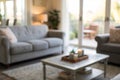 Blurred view of light living room with grey sofas Royalty Free Stock Photo