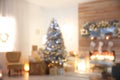 Blurred view of living room interior with Christmas tree Royalty Free Stock Photo