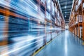 Blurred view of a modern warehouse with digital data streams showcasing cloud storage integration Royalty Free Stock Photo