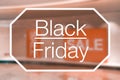 Blurred view of retail store sale display with Black Friday text overlay Royalty Free Stock Photo