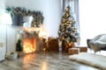 Blurred view of stylish interior with decorated Christmas tree Royalty Free Stock Photo