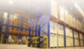 Blurred Warehouse inventory cargo storage with tall shelves. Business and Industrial logistics background