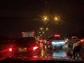 Blurred water drops on mirror of car in the raining day.Ã¢â¬â¹