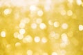 Blurred white gold yellow bokeh sparkle glitter for Christmas festival or Happy new year light background Royalty Free Stock Photo