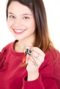 Blurred woman holding out house keys smile happy Royalty Free Stock Photo