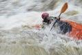 Blurred woman kayaking in river