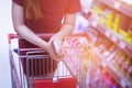 Blurred woman in supermarket.Shopping in department store. Royalty Free Stock Photo