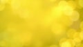 Blurred yellow background with bokeh effect creating a soft and luminous abstract design element Royalty Free Stock Photo