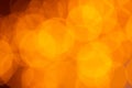 Blurred yellow-orange background. round bokeh patterns. Royalty Free Stock Photo