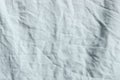 Blurrry image of crumpled fabric.Cropped shot of bed linen.