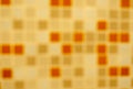 Blurry abstract background of sqaure tiles, red yellow and brown color