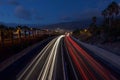 Blurry abstract photo of the lights of cars on the highway Royalty Free Stock Photo
