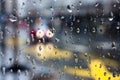 Blurry abstract rainy day with raindrops on glass window Royalty Free Stock Photo