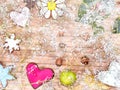 Blurry abstract valentines day, christmas background. Gingerbread hearts, snowflakes, flower on a wooden background