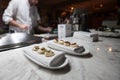 Blurry background of the chef is preparing food in the kitchen