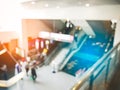 Blurry background of department store with crowd people in convention hall. Abstract concept. Business marketing and event theme. Royalty Free Stock Photo