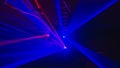 Blurry background with laser blue lights of a disco, dance floor Royalty Free Stock Photo