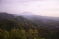 Blurry background of a morning view in the mountains. Landscape with fog. Natural backgrounds. Nature landscape scenery.