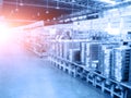 Blurry background of warehouse and storage. Abstract of business concept. Logistics and industrial theme. Blue tone and orange sun