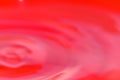 Blurry Backgrounds of Wavy Circles on Red Water Royalty Free Stock Photo