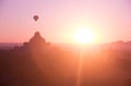 blurry beautiful sunlight and hot air balloon over ancient pagoda in Myanmar