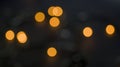 Blurry bokeh light on dark background. Abstract urban night light bokeh. Royalty Free Stock Photo