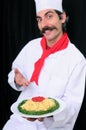 Blurry Chef Showing Spaghetti Plate Royalty Free Stock Photo