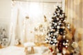 Blurry christmas living room interior with curved furniture