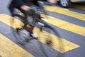 Blurry cyclist on city street