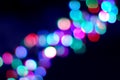 Blurry garland lights diagonal on dark for concept or winter holidays design