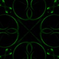 Blurry geometrical low key pattern made of green neon colored curved garlic