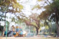 Blurry Green natural background Blur public park, road in nature outdoor in light foliage bokeh bacground, Spring summer defocused