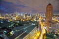 Blurry image of Kuala Lumpur city scape with the glowing background from neon lamps at night Royalty Free Stock Photo