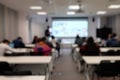 Blurry image of seminar in classroom