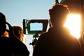 Blurry images of silhouette people behind the scenes