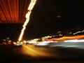 Blurry lights of cars on city streets at night, Light trails from transport - rush hour. Royalty Free Stock Photo