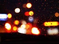 Blurry lights of cars on city streets at night, Transport - rush hour.