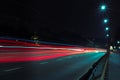 Blurry lights from the headlights of cars on the road Royalty Free Stock Photo