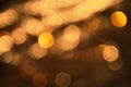Blurry Bronze Lights Background, Party, Celebration Or Christmas Texture Royalty Free Stock Photo