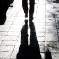 Blurry man legs walking city street Royalty Free Stock Photo