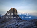 Blurry mountain background with text written - Clouds come and go, the mountain remains.