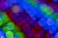 Blurry multicolored garland with glowing lights. Christmas, new year, birthday and wedding concept Royalty Free Stock Photo