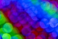 Blurry multicolored garland with glowing lights. Christmas, new year, birthday and wedding concept Royalty Free Stock Photo