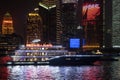 Blurry neon lights of Lokatse night cityscape with ship at river in Shanghai China Royalty Free Stock Photo